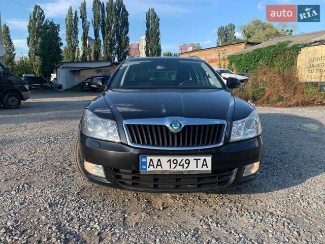 Чорний Шкода Октавія, об'ємом двигуна 1.2 л та пробігом 210 тис. км за 7500 $, фото 1 на Automoto.ua