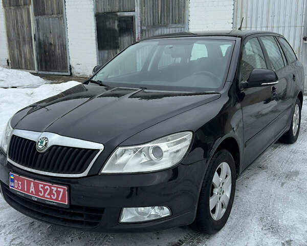 Чорний Шкода Октавія, об'ємом двигуна 1.4 л та пробігом 208 тис. км за 7150 $, фото 1 на Automoto.ua