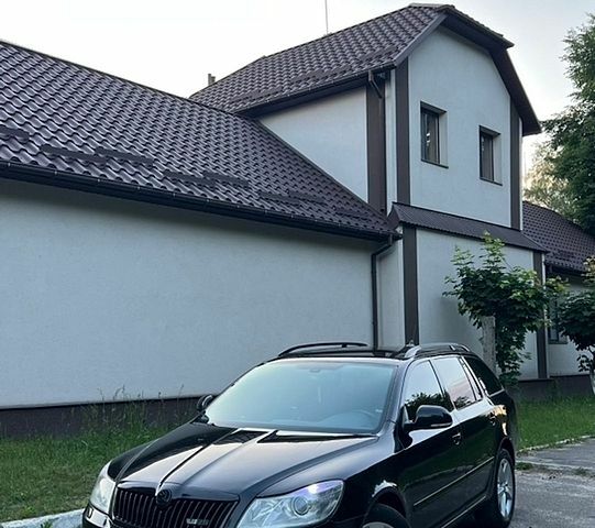 Черный Шкода Октавия, объемом двигателя 2 л и пробегом 290 тыс. км за 8600 $, фото 1 на Automoto.ua