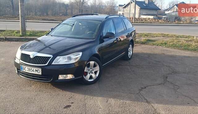 Чорний Шкода Октавія, об'ємом двигуна 1.99 л та пробігом 371 тис. км за 9500 $, фото 1 на Automoto.ua