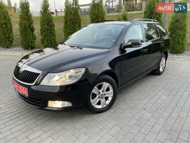 Чорний Шкода Октавія, об'ємом двигуна 1.6 л та пробігом 194 тис. км за 9399 $, фото 1 на Automoto.ua