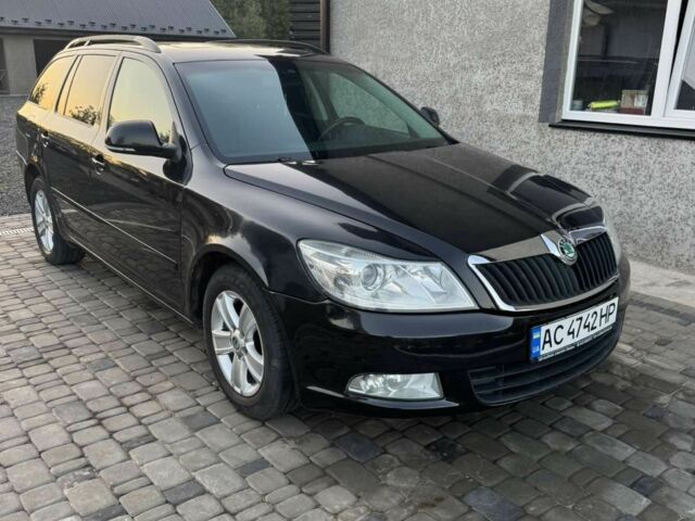 Чорний Шкода Октавія, об'ємом двигуна 1.6 л та пробігом 260 тис. км за 7179 $, фото 1 на Automoto.ua
