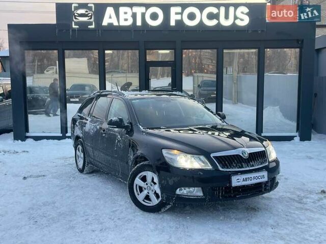 Чорний Шкода Октавія, об'ємом двигуна 1.8 л та пробігом 328 тис. км за 7990 $, фото 1 на Automoto.ua