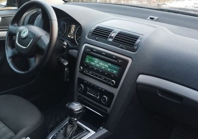 Чорний Шкода Октавія, об'ємом двигуна 1.4 л та пробігом 232 тис. км за 6999 $, фото 1 на Automoto.ua