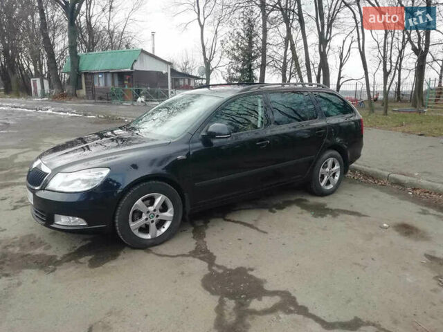 Черный Шкода Октавия, объемом двигателя 1.6 л и пробегом 180 тыс. км за 8000 $, фото 1 на Automoto.ua