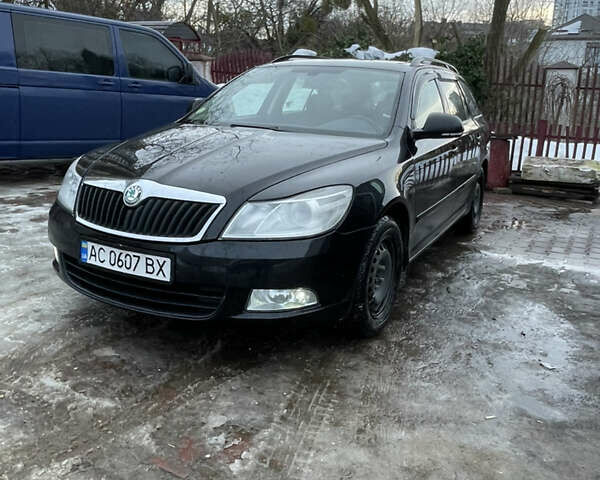 Черный Шкода Октавия, объемом двигателя 1.6 л и пробегом 305 тыс. км за 8400 $, фото 1 на Automoto.ua