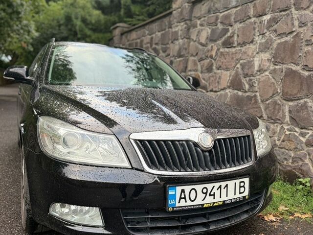 Чорний Шкода Октавія, об'ємом двигуна 1.2 л та пробігом 248 тис. км за 6500 $, фото 1 на Automoto.ua