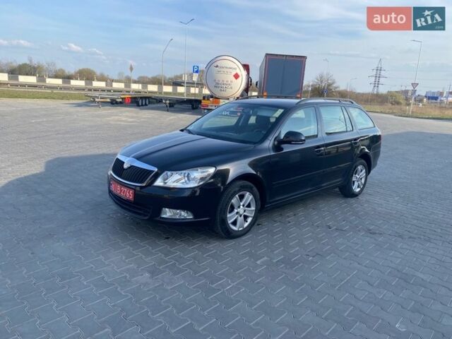 Черный Шкода Октавия, объемом двигателя 1.4 л и пробегом 195 тыс. км за 6097 $, фото 1 на Automoto.ua
