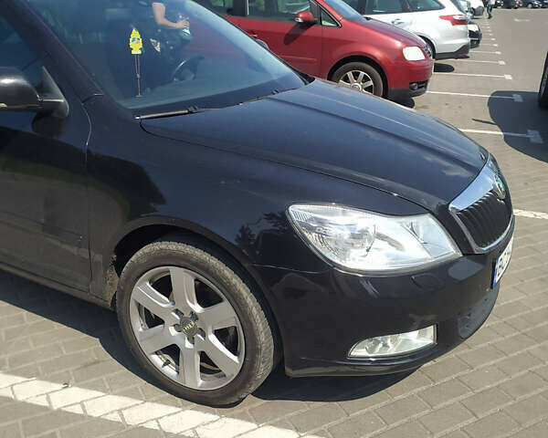 Чорний Шкода Октавія, об'ємом двигуна 1.2 л та пробігом 240 тис. км за 6600 $, фото 1 на Automoto.ua
