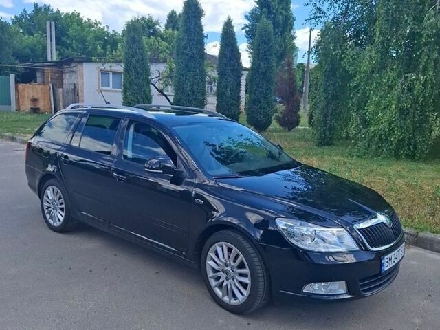 Чорний Шкода Октавія, об'ємом двигуна 1.8 л та пробігом 123 тис. км за 11100 $, фото 1 на Automoto.ua