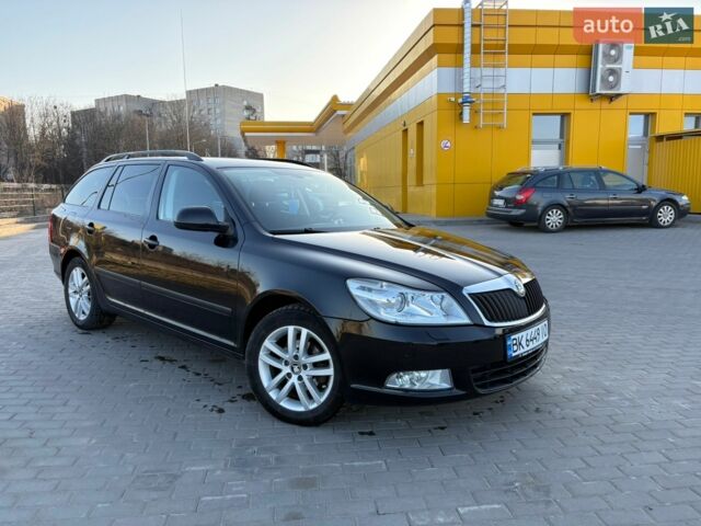 Черный Шкода Октавия, объемом двигателя 1.6 л и пробегом 214 тыс. км за 8300 $, фото 1 на Automoto.ua