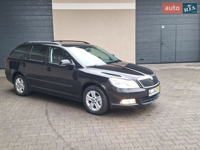 Черный Шкода Октавия, объемом двигателя 1.6 л и пробегом 223 тыс. км за 8450 $, фото 1 на Automoto.ua