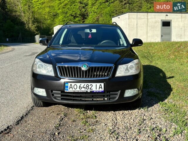 Черный Шкода Октавия, объемом двигателя 2 л и пробегом 241 тыс. км за 9400 $, фото 1 на Automoto.ua