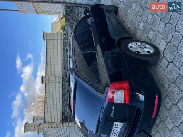 Чорний Шкода Октавія, об'ємом двигуна 1.2 л та пробігом 177 тис. км за 5999 $, фото 1 на Automoto.ua
