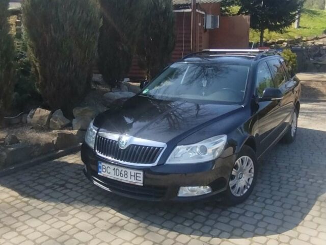 Черный Шкода Октавия, объемом двигателя 1.6 л и пробегом 260 тыс. км за 7300 $, фото 1 на Automoto.ua