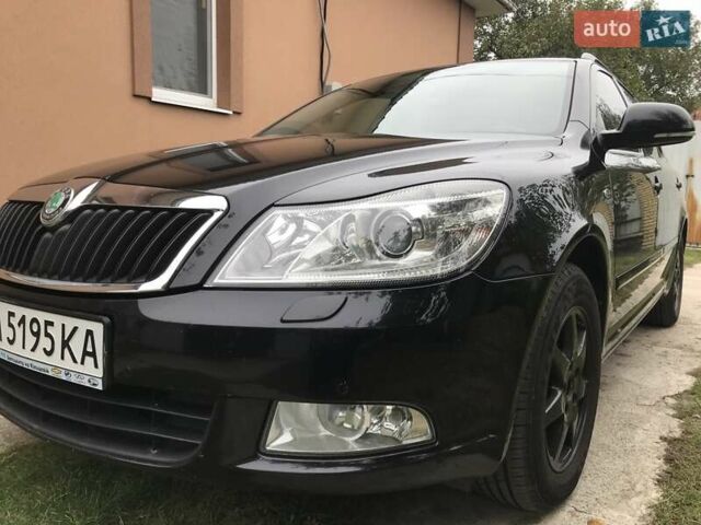 Черный Шкода Октавия, объемом двигателя 1.8 л и пробегом 211 тыс. км за 8099 $, фото 1 на Automoto.ua
