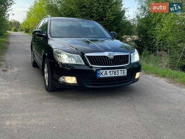 Черный Шкода Октавия, объемом двигателя 1.39 л и пробегом 232 тыс. км за 6950 $, фото 1 на Automoto.ua