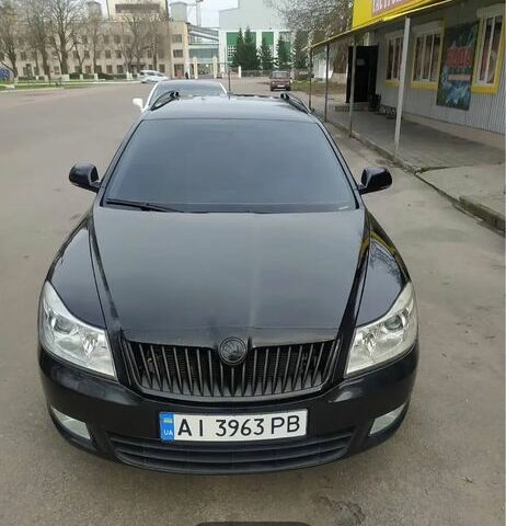 Черный Шкода Октавия, объемом двигателя 2 л и пробегом 320 тыс. км за 7280 $, фото 1 на Automoto.ua
