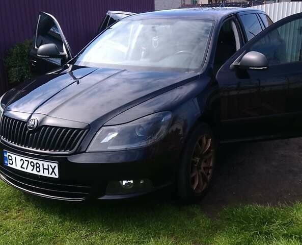 Чорний Шкода Октавія, об'ємом двигуна 1.2 л та пробігом 190 тис. км за 8000 $, фото 1 на Automoto.ua