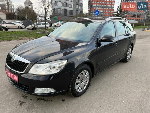 Черный Шкода Октавия, объемом двигателя 1.4 л и пробегом 211 тыс. км за 6800 $, фото 1 на Automoto.ua