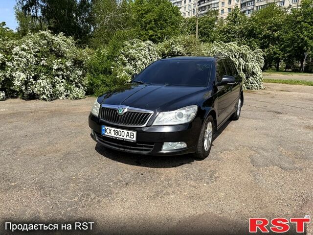 Чорний Шкода Октавія, об'ємом двигуна 2 л та пробігом 325 тис. км за 8800 $, фото 1 на Automoto.ua