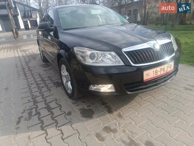 Черный Шкода Октавия, объемом двигателя 1.2 л и пробегом 214 тыс. км за 6900 $, фото 1 на Automoto.ua