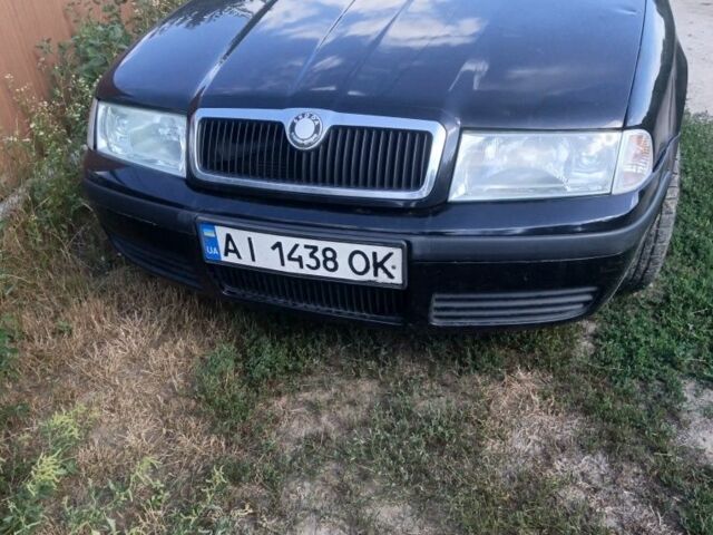 Черный Шкода Октавия, объемом двигателя 1.6 л и пробегом 198 тыс. км за 3799 $, фото 1 на Automoto.ua