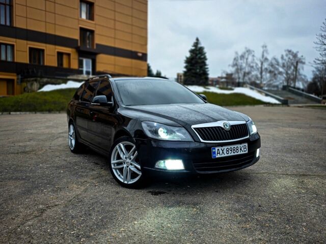 Черный Шкода Октавия, объемом двигателя 1.6 л и пробегом 205 тыс. км за 8599 $, фото 1 на Automoto.ua