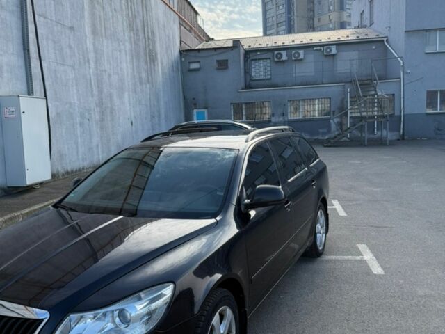 Черный Шкода Октавия, объемом двигателя 1.6 л и пробегом 232 тыс. км за 9500 $, фото 1 на Automoto.ua