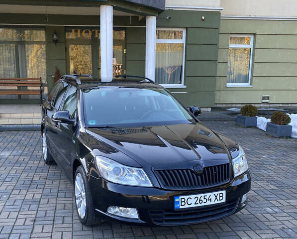 Чорний Шкода Октавія, об'ємом двигуна 1.4 л та пробігом 145 тис. км за 6999 $, фото 1 на Automoto.ua