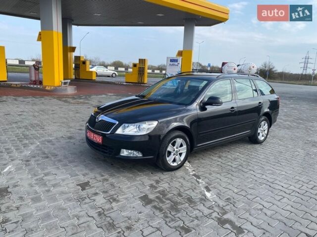 Черный Шкода Октавия, объемом двигателя 1.4 л и пробегом 195 тыс. км за 6499 $, фото 1 на Automoto.ua