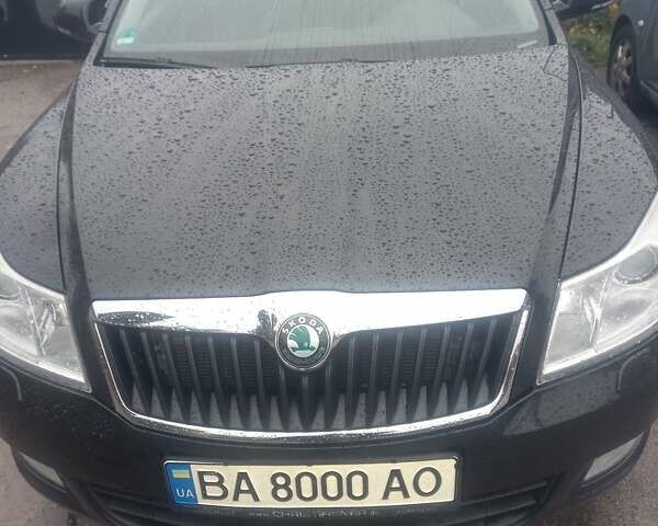 Черный Шкода Октавия, объемом двигателя 2 л и пробегом 306 тыс. км за 10200 $, фото 1 на Automoto.ua