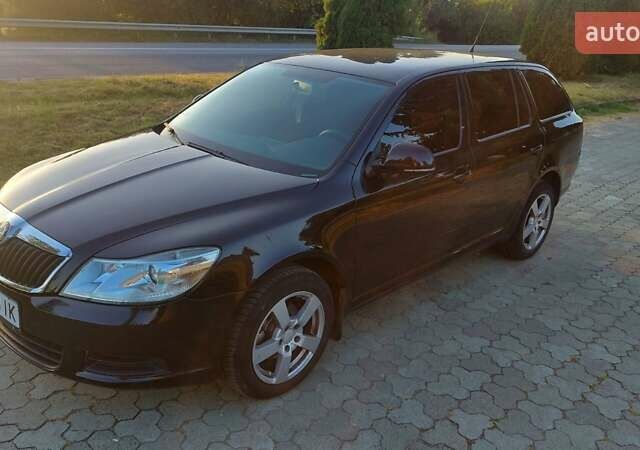 Чорний Шкода Октавія, об'ємом двигуна 1.6 л та пробігом 317 тис. км за 8104 $, фото 1 на Automoto.ua