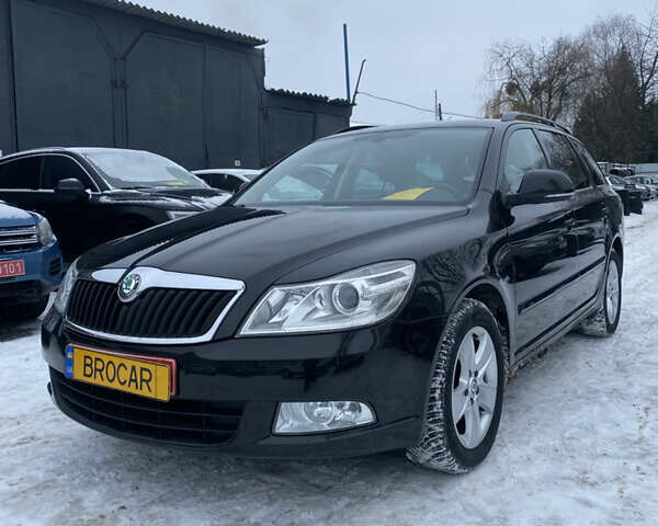 Чорний Шкода Октавія, об'ємом двигуна 1.2 л та пробігом 221 тис. км за 6900 $, фото 1 на Automoto.ua