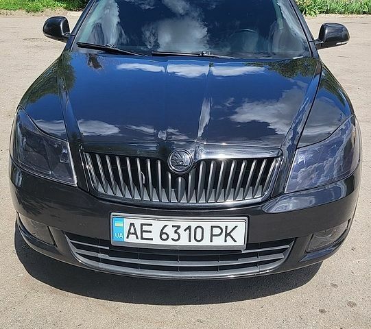 Черный Шкода Октавия, объемом двигателя 1.6 л и пробегом 267 тыс. км за 7600 $, фото 1 на Automoto.ua