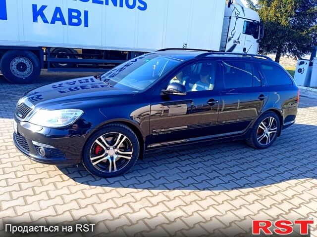 Черный Шкода Октавия, объемом двигателя 2 л и пробегом 215 тыс. км за 12300 $, фото 1 на Automoto.ua