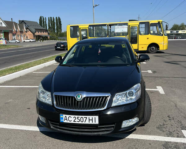 Черный Шкода Октавия, объемом двигателя 2 л и пробегом 267 тыс. км за 9500 $, фото 1 на Automoto.ua
