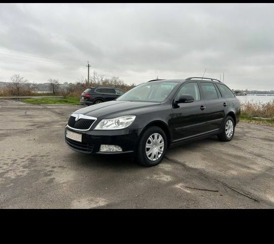 Чорний Шкода Октавія, об'ємом двигуна 1.8 л та пробігом 230 тис. км за 6750 $, фото 1 на Automoto.ua