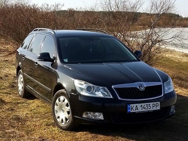 Черный Шкода Октавия, объемом двигателя 1.6 л и пробегом 188 тыс. км за 7999 $, фото 1 на Automoto.ua