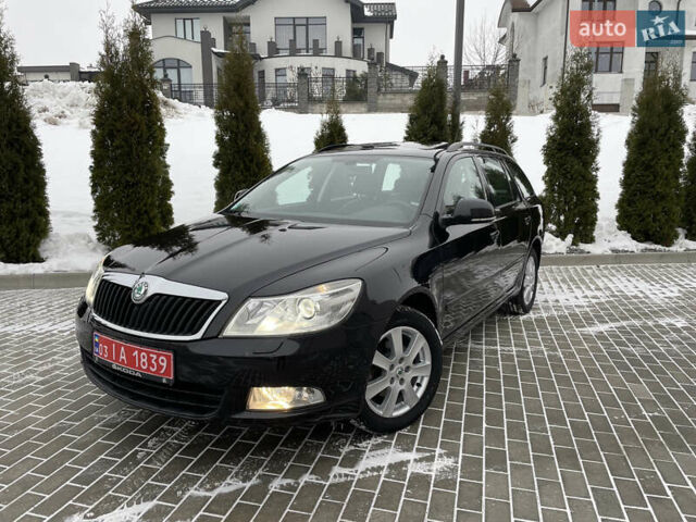Черный Шкода Октавия, объемом двигателя 1.6 л и пробегом 201 тыс. км за 9799 $, фото 1 на Automoto.ua