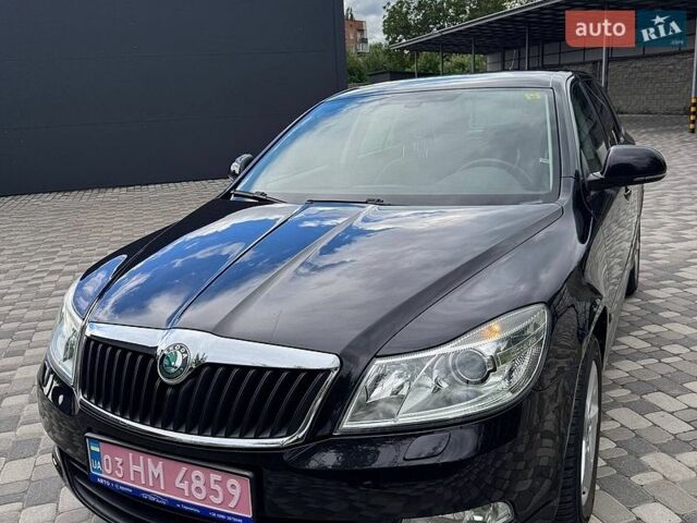 Чорний Шкода Октавія, об'ємом двигуна 1.8 л та пробігом 195 тис. км за 8999 $, фото 1 на Automoto.ua
