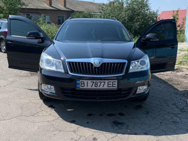 Черный Шкода Октавия, объемом двигателя 1.8 л и пробегом 165 тыс. км за 10500 $, фото 1 на Automoto.ua