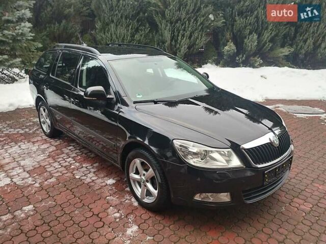 Черный Шкода Октавия, объемом двигателя 1.6 л и пробегом 243 тыс. км за 9350 $, фото 1 на Automoto.ua
