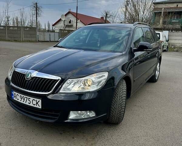 Черный Шкода Октавия, объемом двигателя 2 л и пробегом 320 тыс. км за 9500 $, фото 1 на Automoto.ua