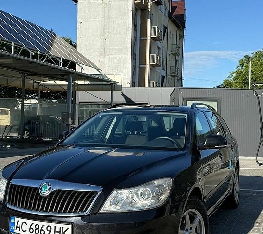 Черный Шкода Октавия, объемом двигателя 1.8 л и пробегом 290 тыс. км за 7400 $, фото 1 на Automoto.ua