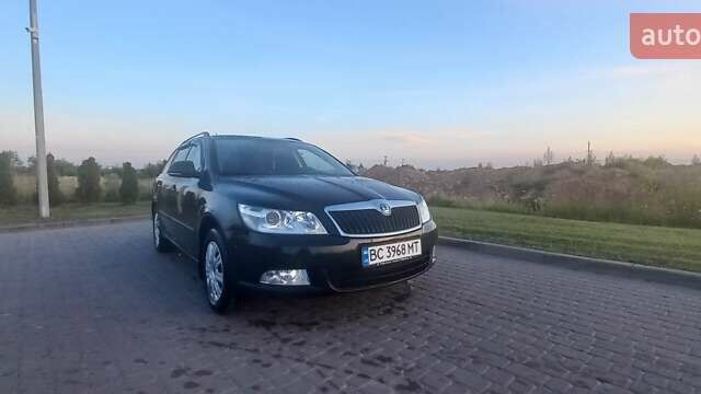 Черный Шкода Октавия, объемом двигателя 1.6 л и пробегом 270 тыс. км за 7550 $, фото 1 на Automoto.ua