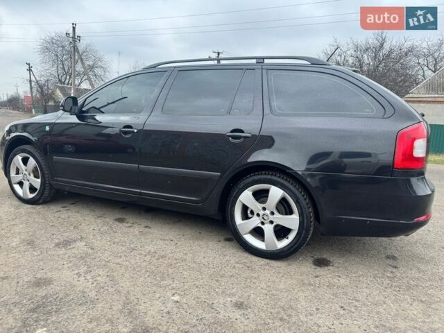 Черный Шкода Октавия, объемом двигателя 1.6 л и пробегом 235 тыс. км за 9500 $, фото 1 на Automoto.ua