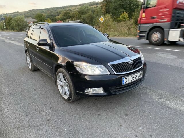 Чорний Шкода Октавія, об'ємом двигуна 2 л та пробігом 245 тис. км за 7527 $, фото 1 на Automoto.ua