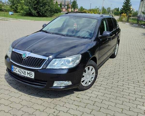 Черный Шкода Октавия, объемом двигателя 1.6 л и пробегом 275 тыс. км за 8150 $, фото 1 на Automoto.ua