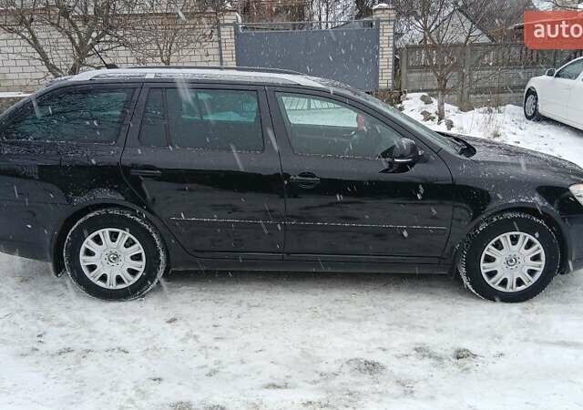 Чорний Шкода Октавія, об'ємом двигуна 1.6 л та пробігом 261 тис. км за 7999 $, фото 1 на Automoto.ua